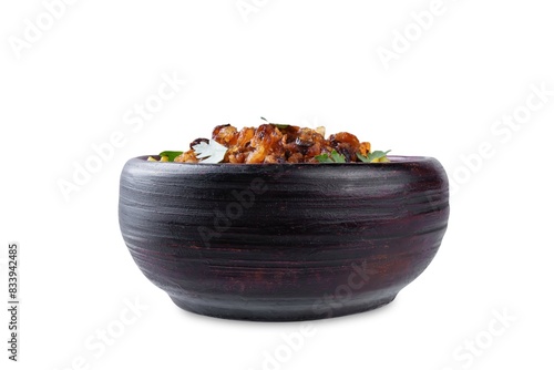 Fried onion lentil fried rice in a plate, moujadara on a white isolated background