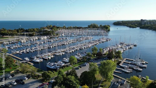Aerial drone footage of marina sail boats in Humber Bay Etobicoke Toronto on a sunny day with blue sky. Lake Ontario photo