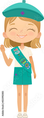 Young smiling blond girl scout wearing sash with badges isolated on white background. Female scouter, Junior ligue Scout Girls troop