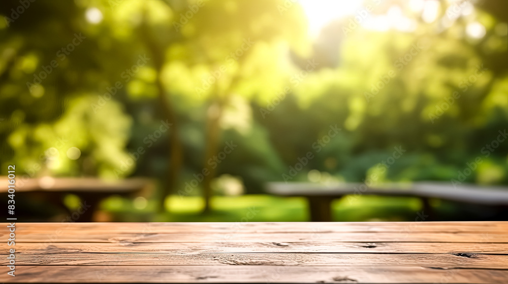 A wooden table with a vase of plants on it. A wooden table with a vase of plants on it.
