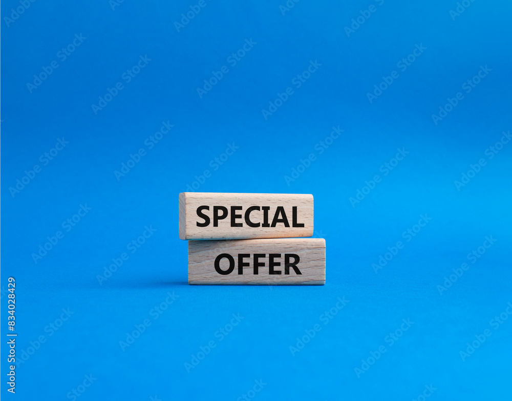 Special offer symbol. Concept word Special offer on wooden blocks. Beautiful blue background. Business and Special offer concept. Copy space Special offer symbol. Concept word Special offer on wooden blocks. Beautiful blue background. Business and Special offer concept. Copy space