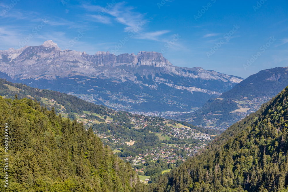 Fototapeta premium Chamonix Montblanc beautiful alpine mountain summits landscape. Alps mountains with snow and glacier above green valley of Chamonix in France. Alps beautiful scenery in summer