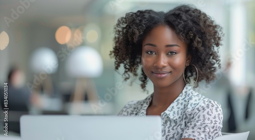 Woman Sitting in Front of Laptop Computer