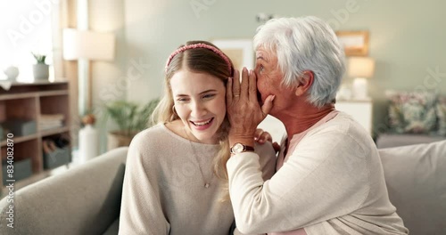 Family secret, woman and grandmother in home for whisper, gossip and talking for news on living room sofa. Quiet conversation, confidential and senior person with girl listening to private mystery photo