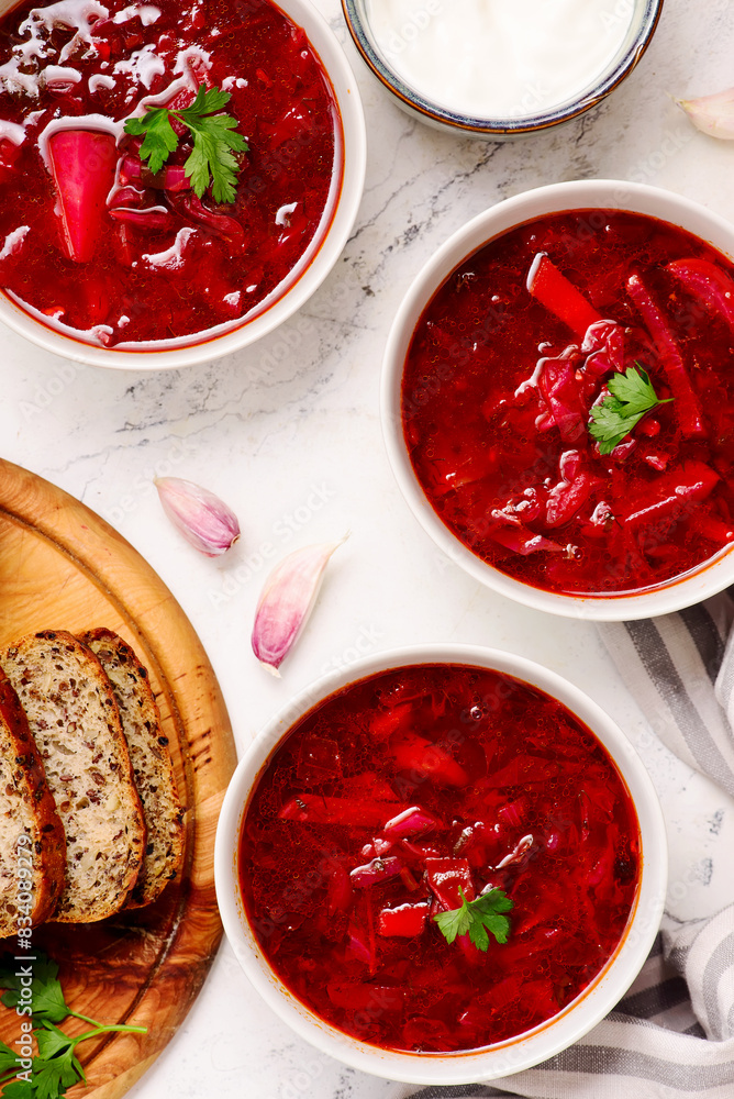 Ukrainian borscht with sour cream in bowls. top view. .style hugge Ukrainian borscht with sour cream in bowls. top view. .style hugge