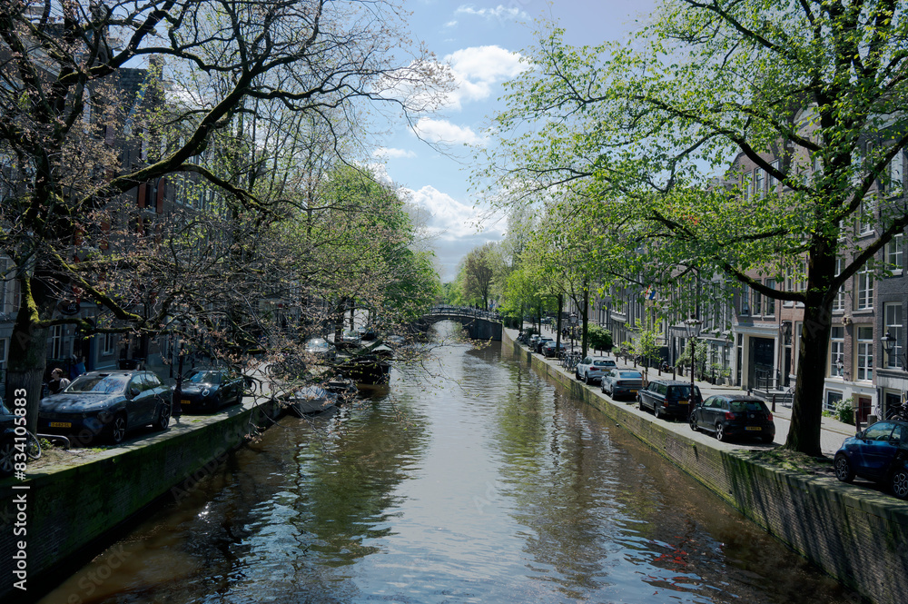 Amsterdam, capital of Netherlands, a city well known for its elaborate system of water canals Amsterdam, capital of Netherlands, a city well known for its elaborate system of water canals