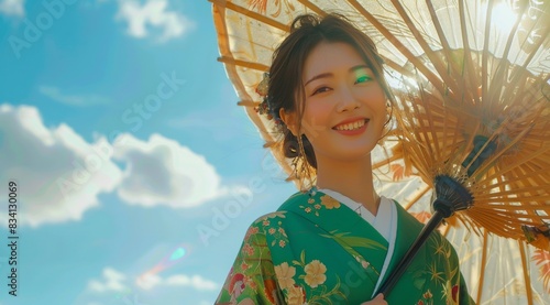 Woman Wearing Traditional Japanese Kimono With Umbrella Under Blue Sky
