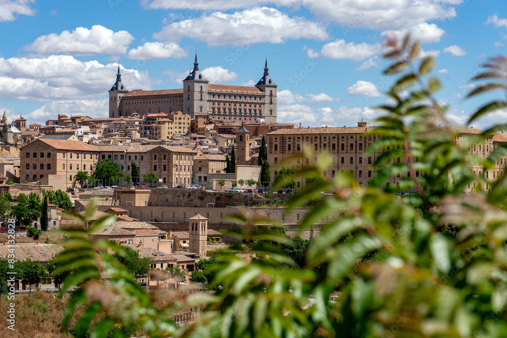 Panoramic view of the UNESCO World Heritage site of the city of Toledo since Valley lookout in a sunny day. Castilla la Mancha, Spain.