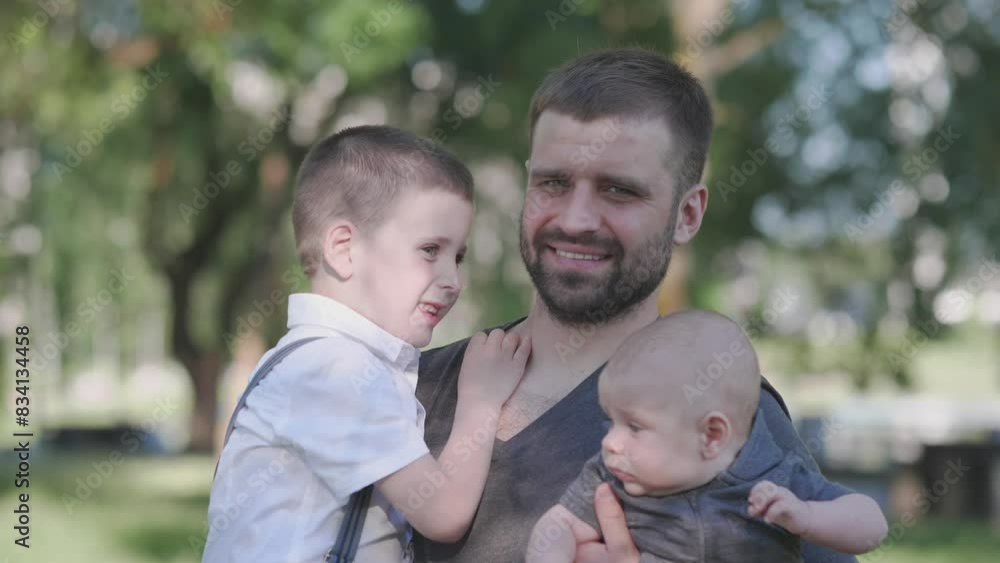 Happy father and two little sons portrait Happy father and two little sons portrait