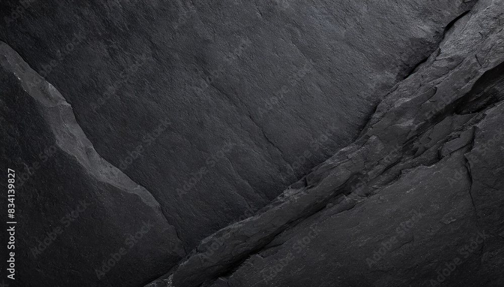 dark, textured black rock surface with dramatic lighting, symbolizing strength and resilience dark, textured black rock surface with dramatic lighting, symbolizing strength and resilience
