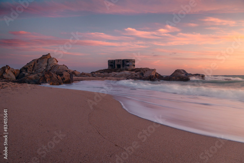 Sunset hues at Atlanterra Beach Bunker photo