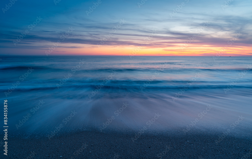 Serene sunset at Atlanterra Beach Serene sunset at Atlanterra Beach