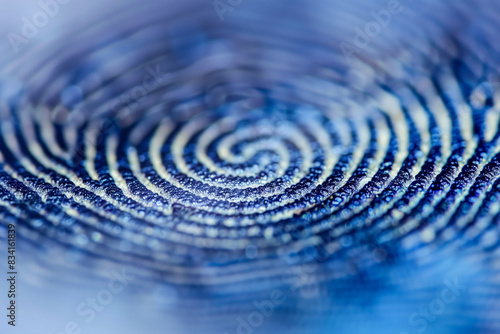 Close-up fingerprint on blue background