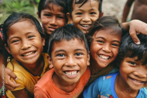 Portrait of a group of asian children smiling at the camera