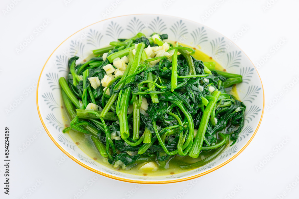 A dish of garlic water spinach