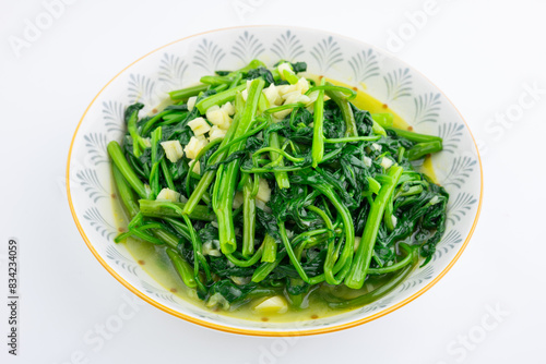 A dish of garlic water spinach