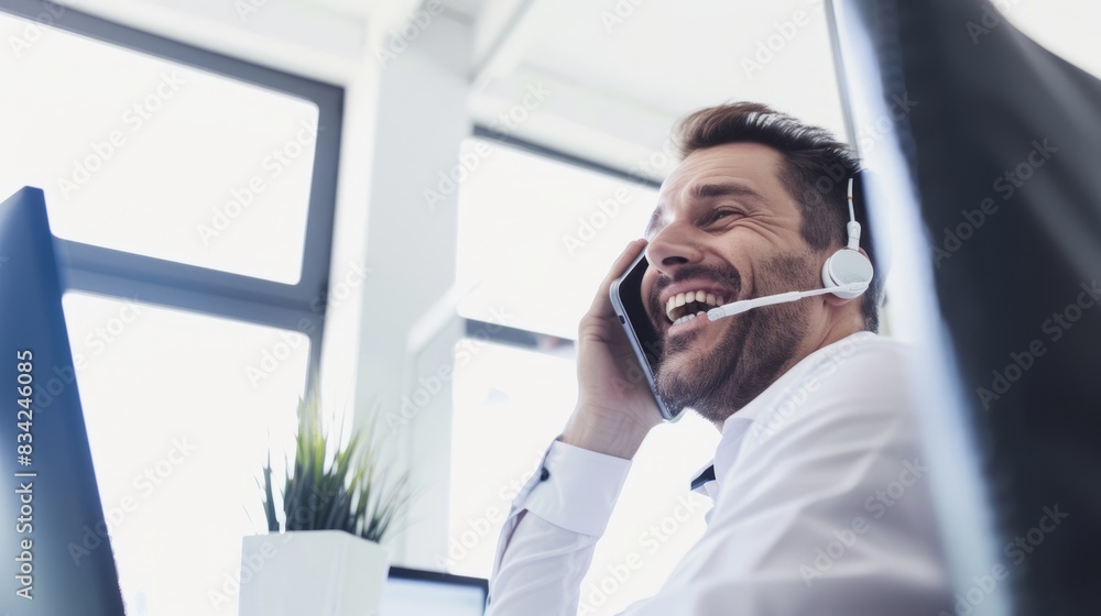 Business leaders or professional managers wear business attire in their offices to communicate with clients on the phone, against a blurry white office background Business leaders or professional managers wear business attire in their offices to communicate with clients on the phone, against a blurry white office background