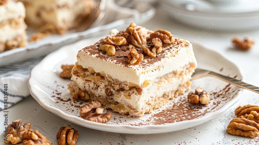 Creamy walnut dessert served on a white plate Creamy walnut dessert served on a white plate