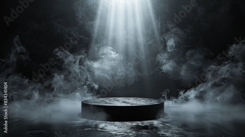 A dark, mysterious scene with a spotlight shining on a circular platform surrounded by fog. Perfect for product displays.
