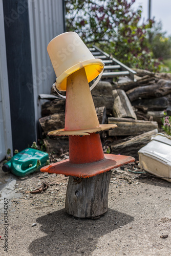 bucket on top of traffic cones  photo