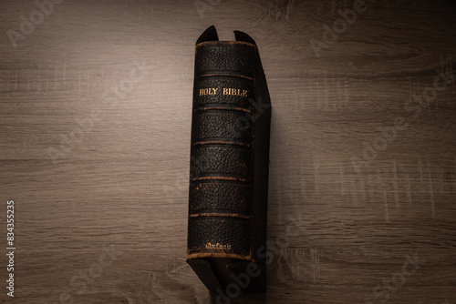 Slika na platnu Holy Bible in black leather cover