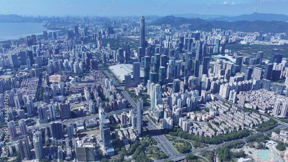Explore the towering skyline of Shenzhen's Futian and Luohu CBD districts, epitomizing the Greater Bay Area's thriving economic powerhouse near Hong Kong Explore the towering skyline of Shenzhen's Futian and Luohu CBD districts, epitomizing the Greater Bay Area's thriving economic powerhouse near Hong Kong