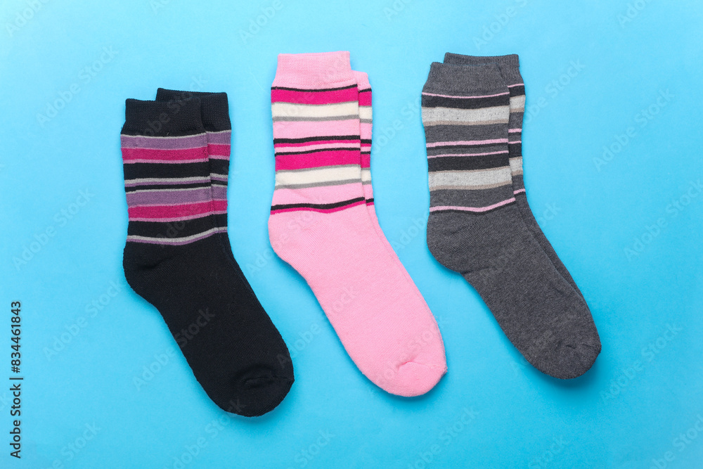 Colored socks on a blue background Colored socks on a blue background
