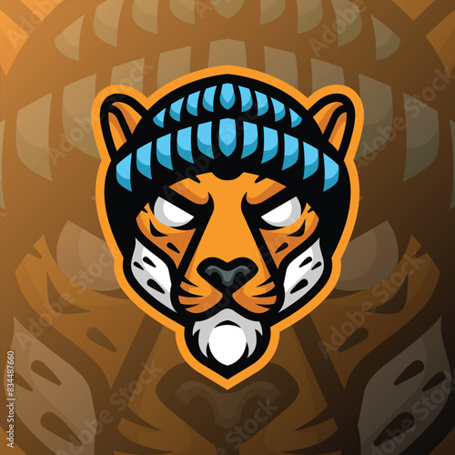 A cheetah head wearing a blue beanie hat