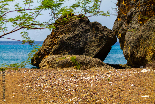 Rocks on the coast of the island of Curaçao photo