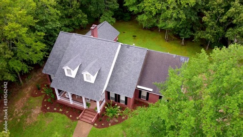 Video of new roof and old roof on house, showing comparison of the two.