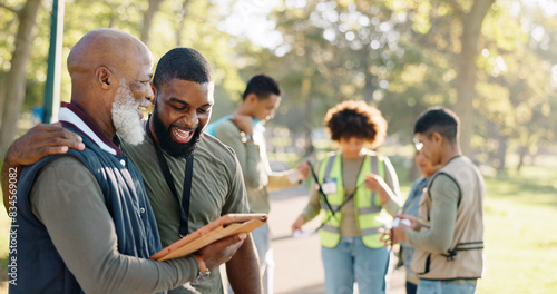 Park, people and volunteers checklist with tablet for support, community project or nature sustainability. Humanitarian, recycling or senior leader in charity service or NGO for pollution cleanup photo