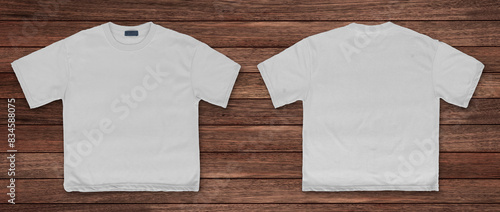 white, t-shirt, free size, front and back view, on a vintage wood plank background.