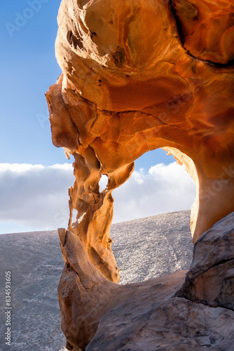 Golden Sunlight Pouring Through Arco De Las Penitas in Fuerteventura at Sunset
