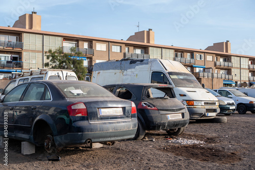 A Multitude of Vehicles Aligned in Front of the Urban Dwelling