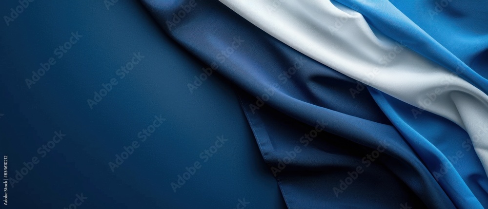 Obraz premium Explore the elegance of professionalism with a sleek, blank mockup featuring a minimalist design and alternating shades of blue and white fabric.