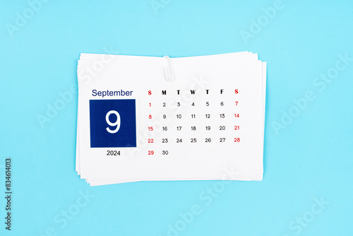 September Calendar 2024 page on blue background. © gamjai