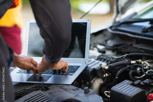 car service center mechanics are checking condition car and engine make sure they are ready use and in perfect condition according center warranty. periodic vehicle inspections for safety in driving.