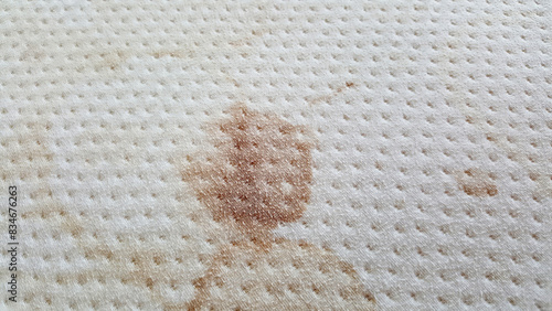 close-up yellow stains on mattresses, dirty mattress dust mites bed bugs