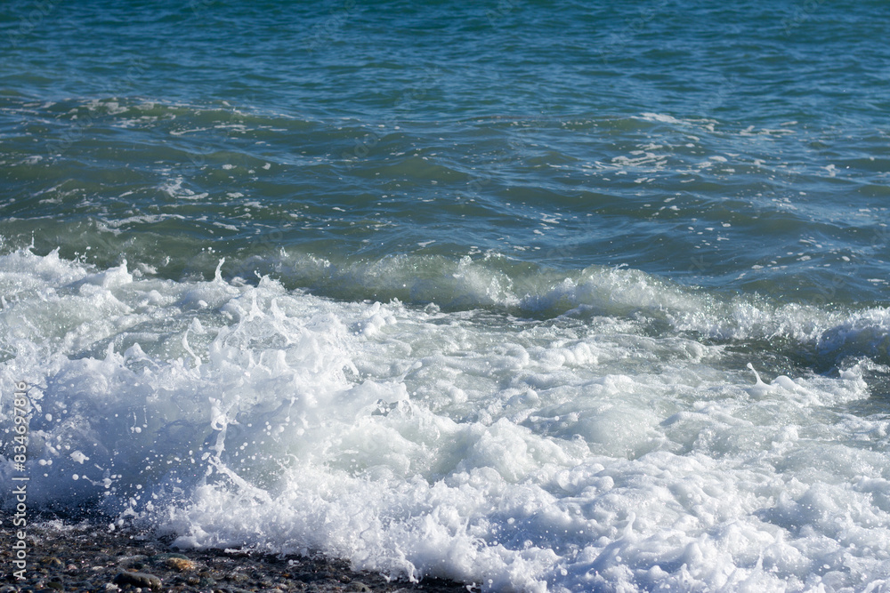 Fototapeta premium Sea wave crashing on the shore