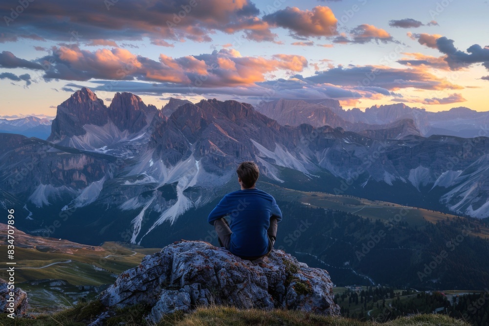 Fototapeta premium Man Enjoying Sunset View in Majestic Mountains