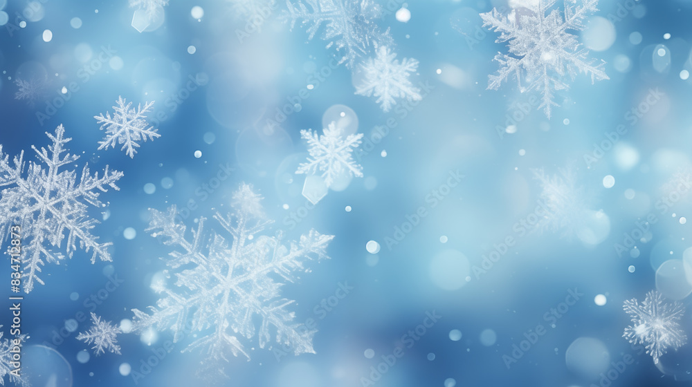 Falling Snowflakes on Blue Abstract Background with Bokeh and Copy Space Falling Snowflakes on Blue Abstract Background with Bokeh and Copy Space