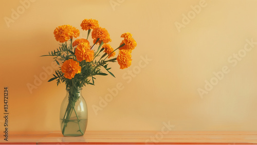Wallpaper Mural marigold flowers in a in a glass vase in the corner over wall background. bouquet of flowers in vase. home decoration concept. Torontodigital.ca