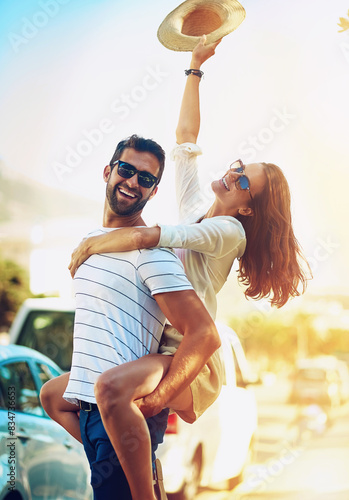 Konstfotografi Couple, people and happy on piggyback in outdoor with lens flare for summer holiday and fun in Brazil