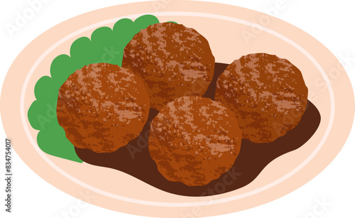 Meatball with gravy and vegetables on a plate