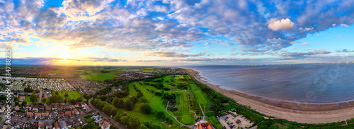 Sunset Aerial Panoramic View of the UK Seaside Skegness  a busy tourist town with something for everyone  from stunning campsites to a sunset to die for  showcases the beauty of a serene sunset