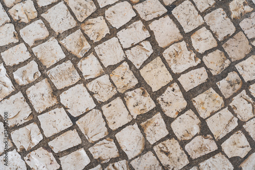 Texture of an calzada on the streets of Lisboa in Portugal. Close up photo.