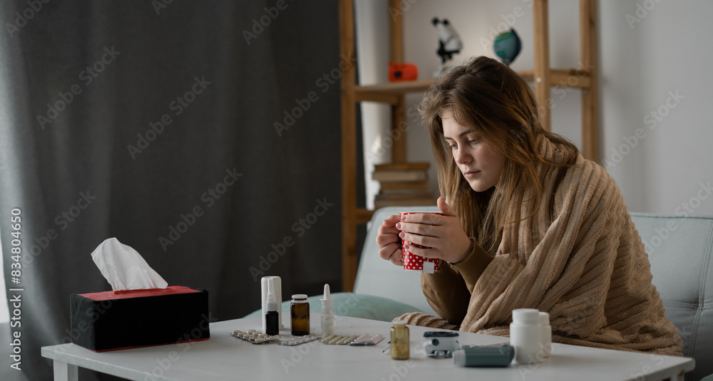 unhealthy adult woman drinks hot tea for cold. Prevention of viral diseases unhealthy adult woman drinks hot tea for cold. Prevention of viral diseases