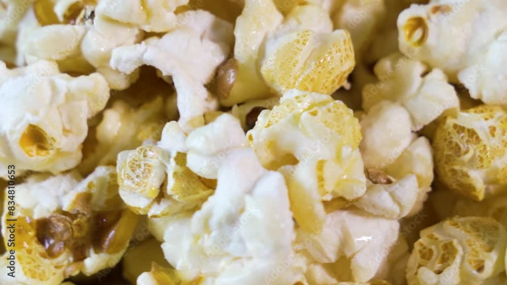 Popcorn in yellow butter, delicious close-up beauty shot Popcorn in yellow butter, delicious close-up beauty shot
