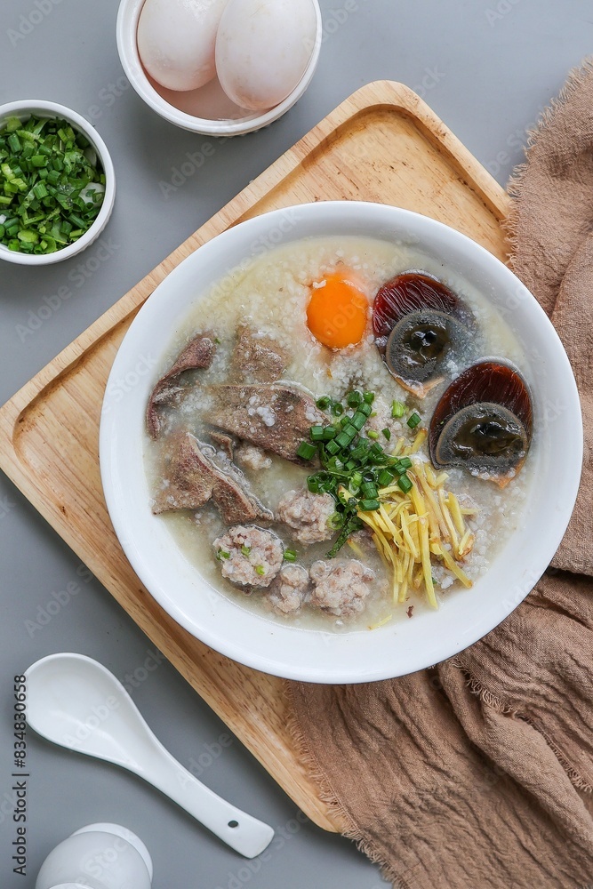 Congee or rice porridge with pork and eggs, thai food, asian food, chinese food