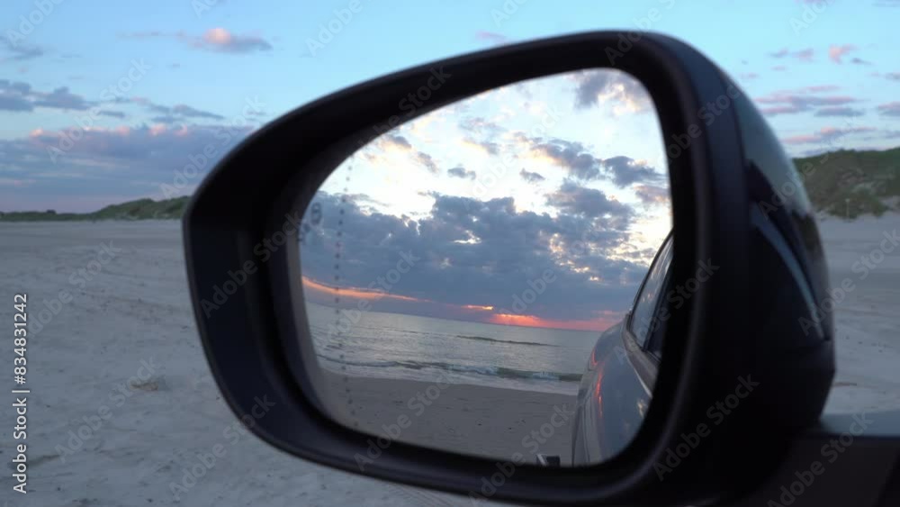 Sunset view on car mirror Sunset view on car mirror